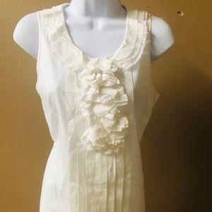 A beautiful J.Crew blouse cream color and size 2.